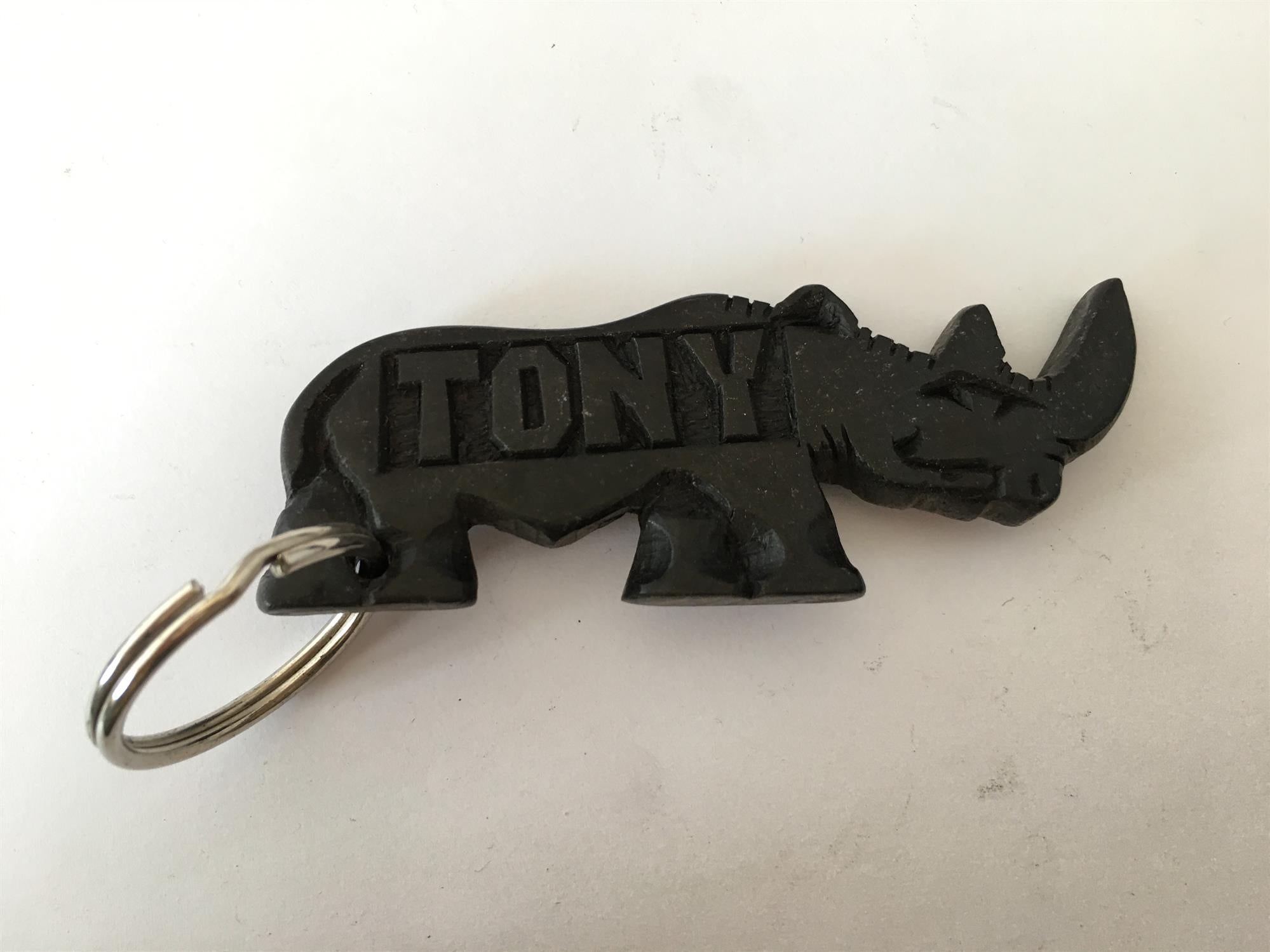 Hand-carved zebra key ring by A1 Decoy Ltd featuring detailed animal design on a keychain.