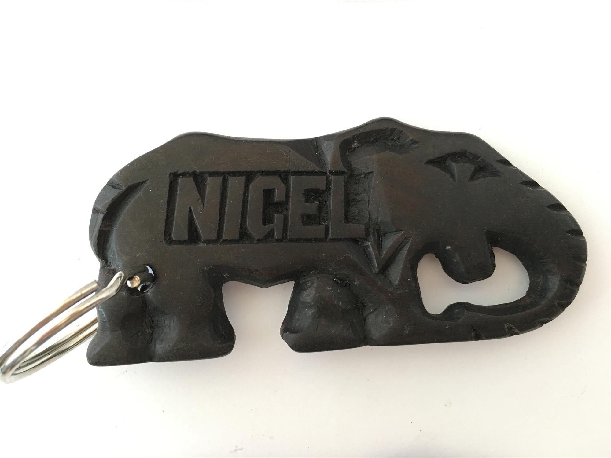 Hand-carved zebra key ring from A1 DECOY LTD featuring detailed animal design on a metal keychain.