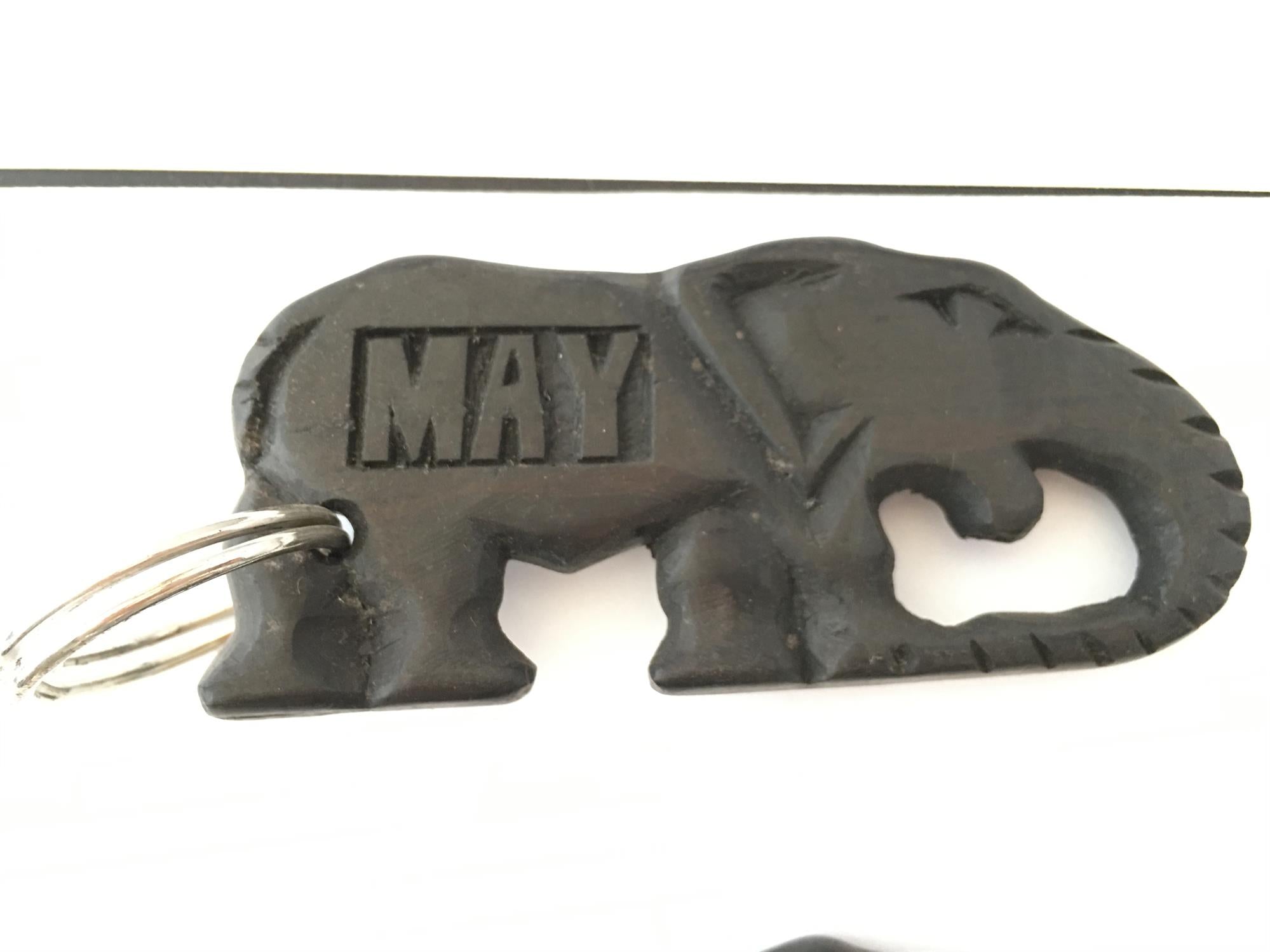 Hand-carved zebra key ring by A1 DECOY LTD featuring detailed animal design and natural wood texture.