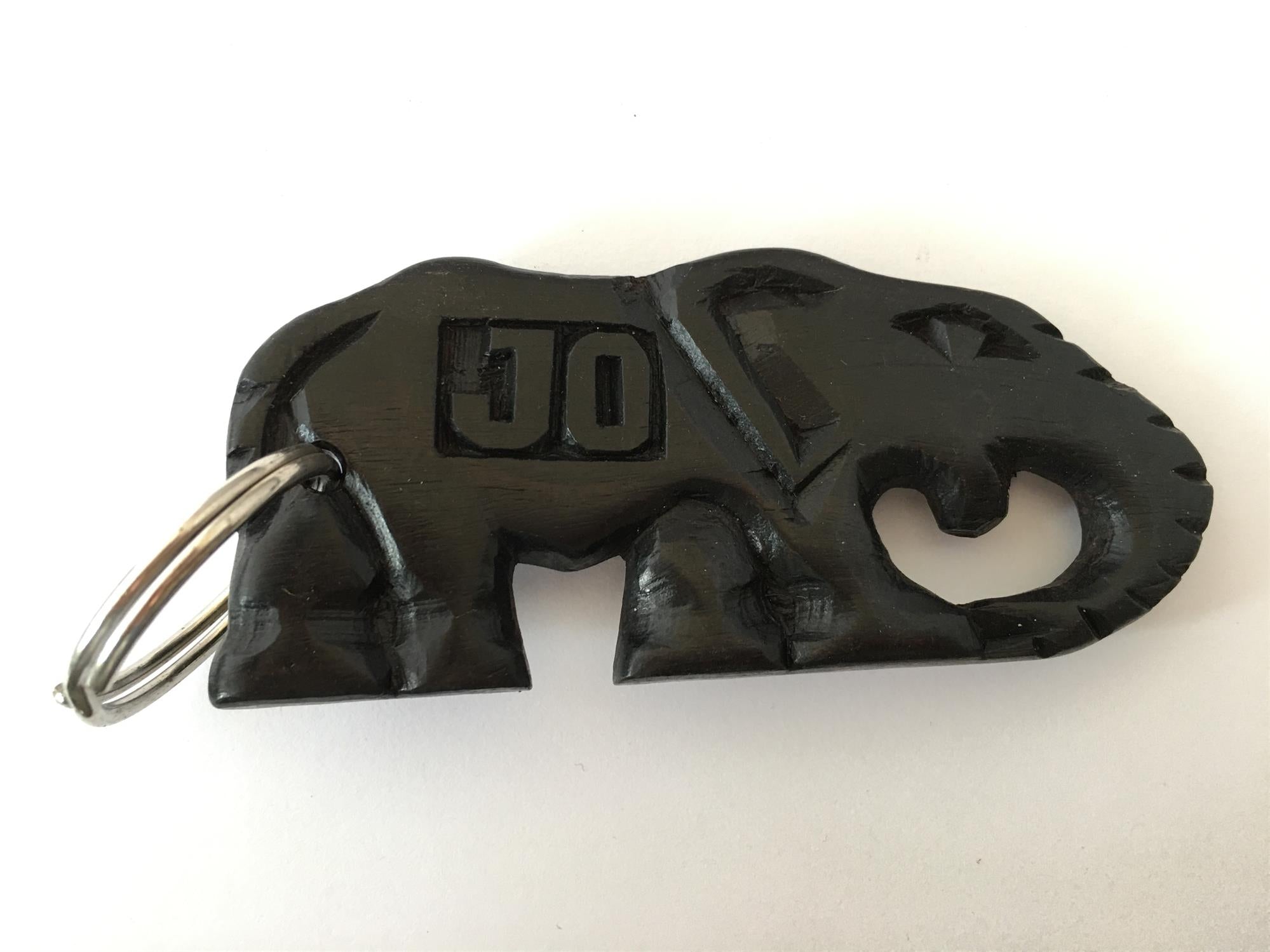 Hand-carved zebra key ring by A1 Decoy Ltd featuring detailed animal carving on a durable keychain.