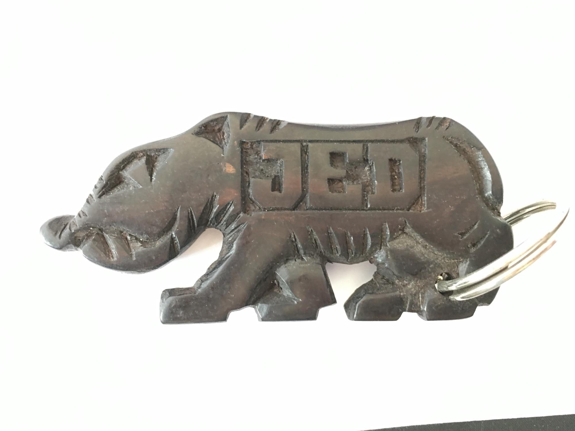 Hand-carved zebra key ring from A1 DECOY LTD featuring detailed animal design and natural wood finish.