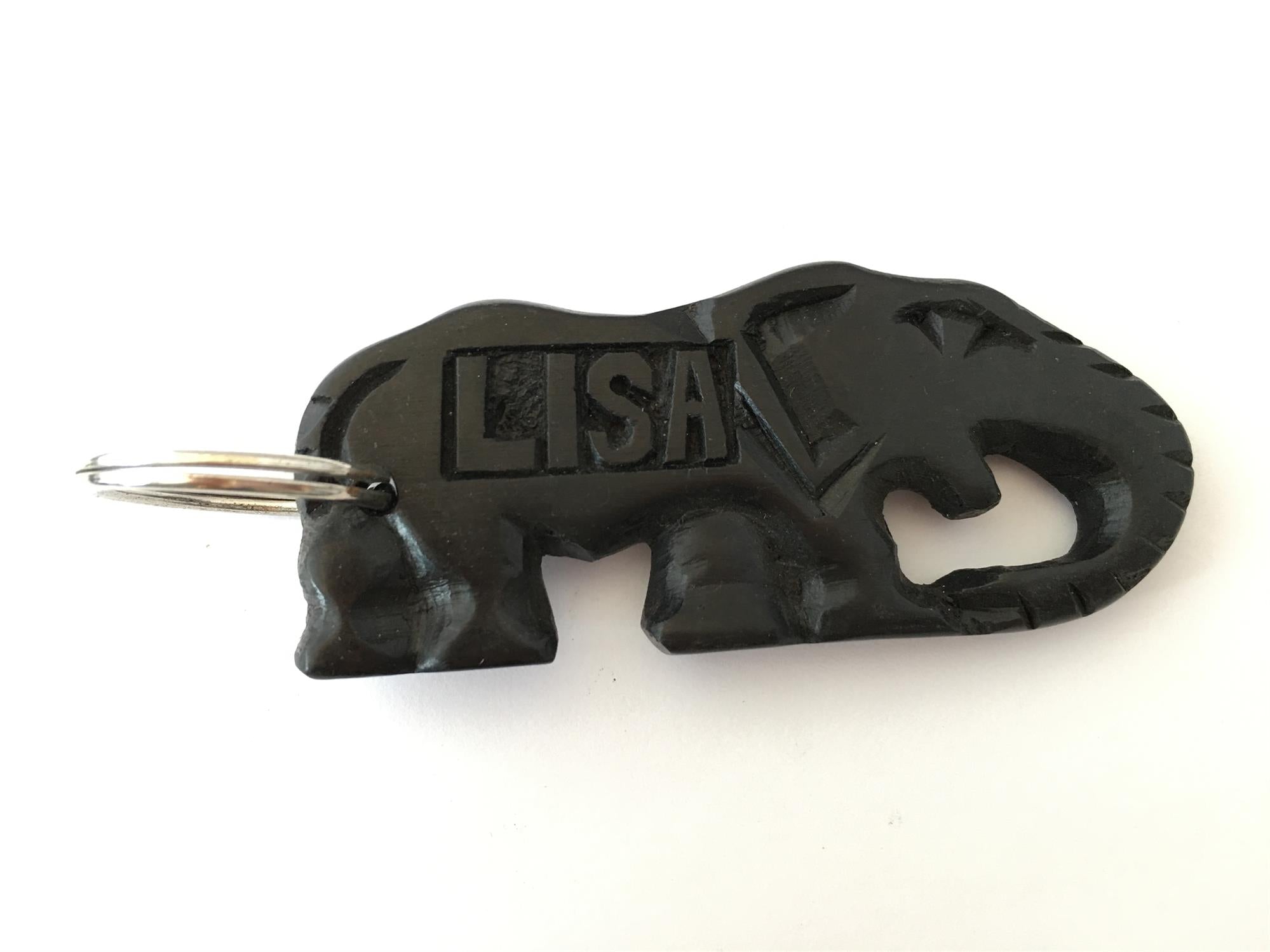 Hand-carved zebra key ring by A1 Decoy Ltd featuring detailed animal design and natural wood texture.