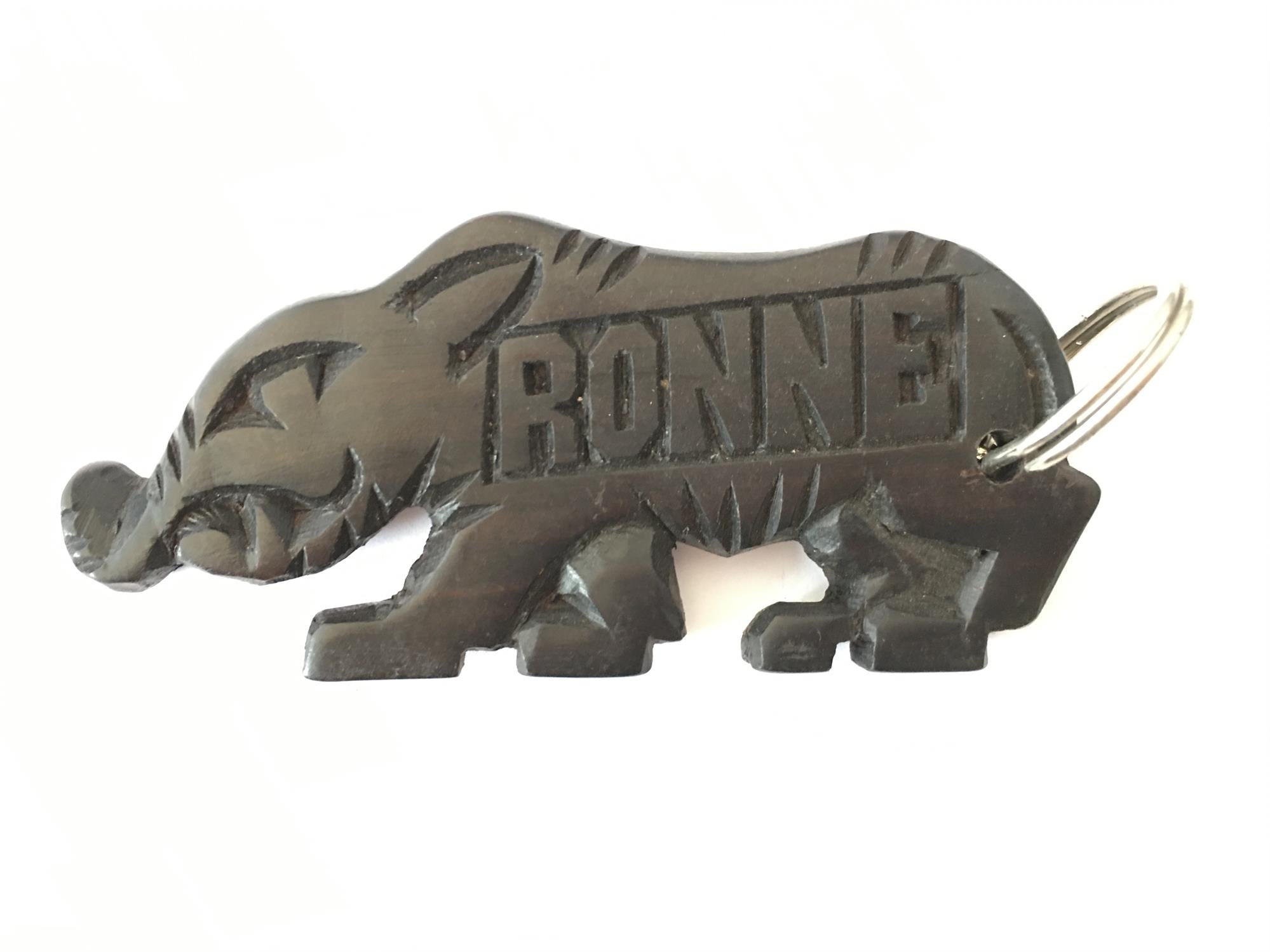 Hand-carved zebra key ring by A1 Decoy Ltd featuring detailed animal design on a metal keyring.
