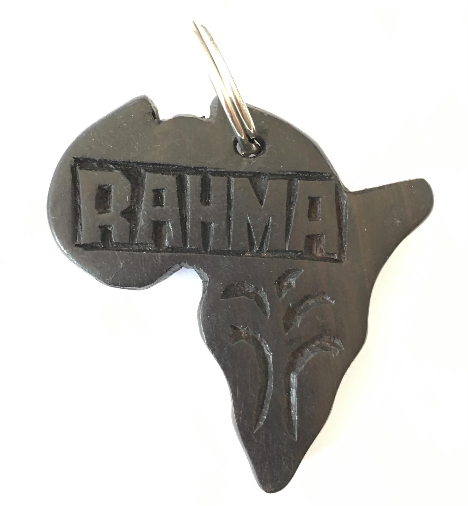 Hand-carved zebra key rings by A1 Decoy Ltd featuring detailed animal design and natural wood texture.