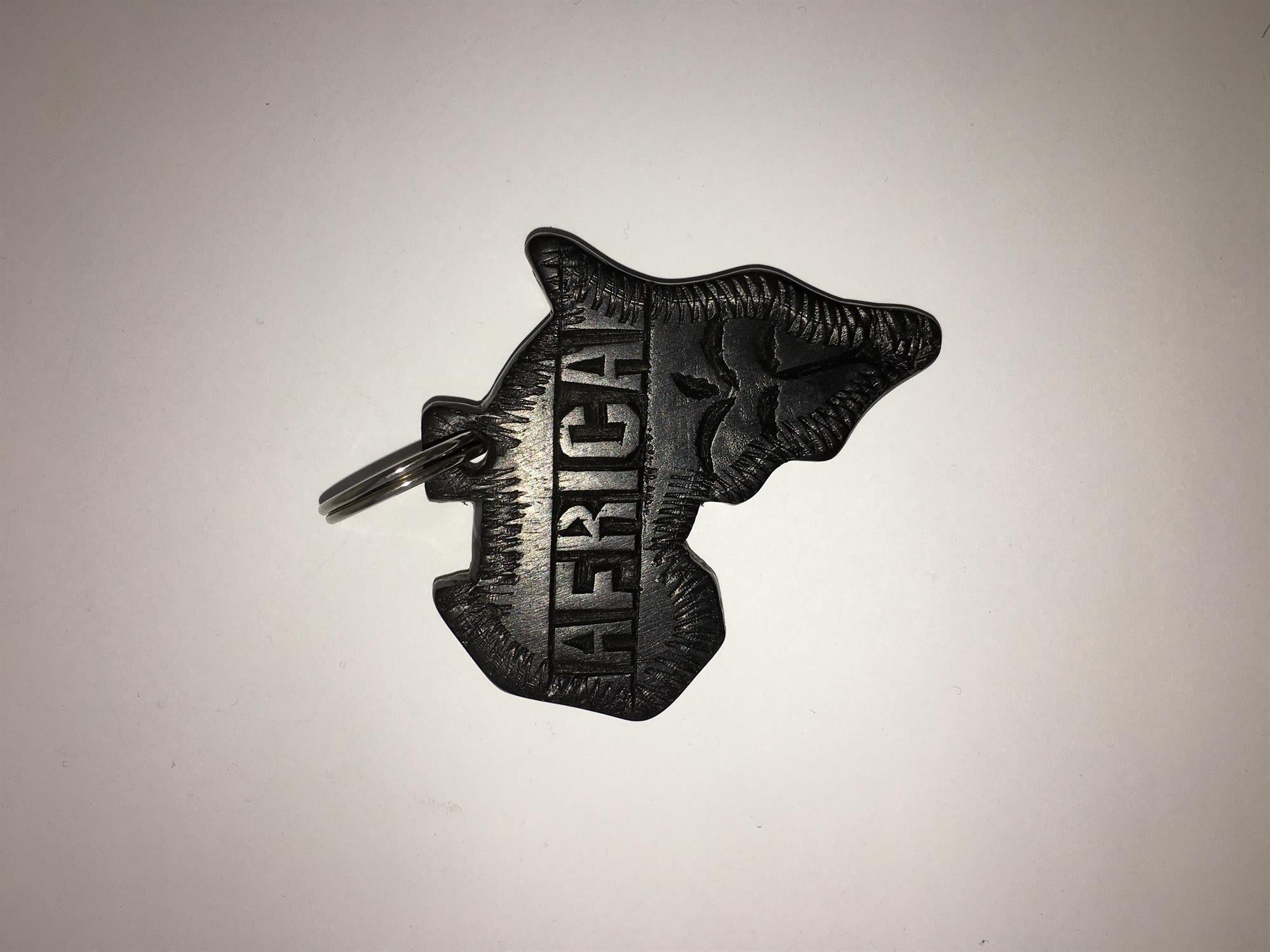 Hand-carved zebra key ring from A1 Decoy Ltd featuring detailed animal design and natural wood craftsmanship.