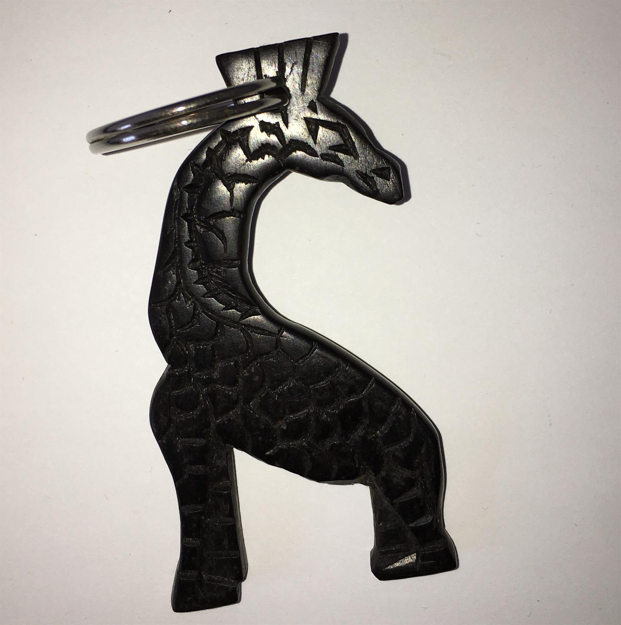 Hand-carved zebra key ring from A1 DECOY LTD featuring detailed animal design and natural wood texture.