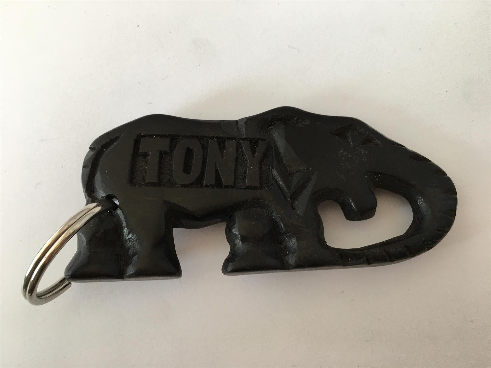 Hand-carved zebra key ring by A1 Decoy Ltd featuring detailed animal design on a metal key ring.
