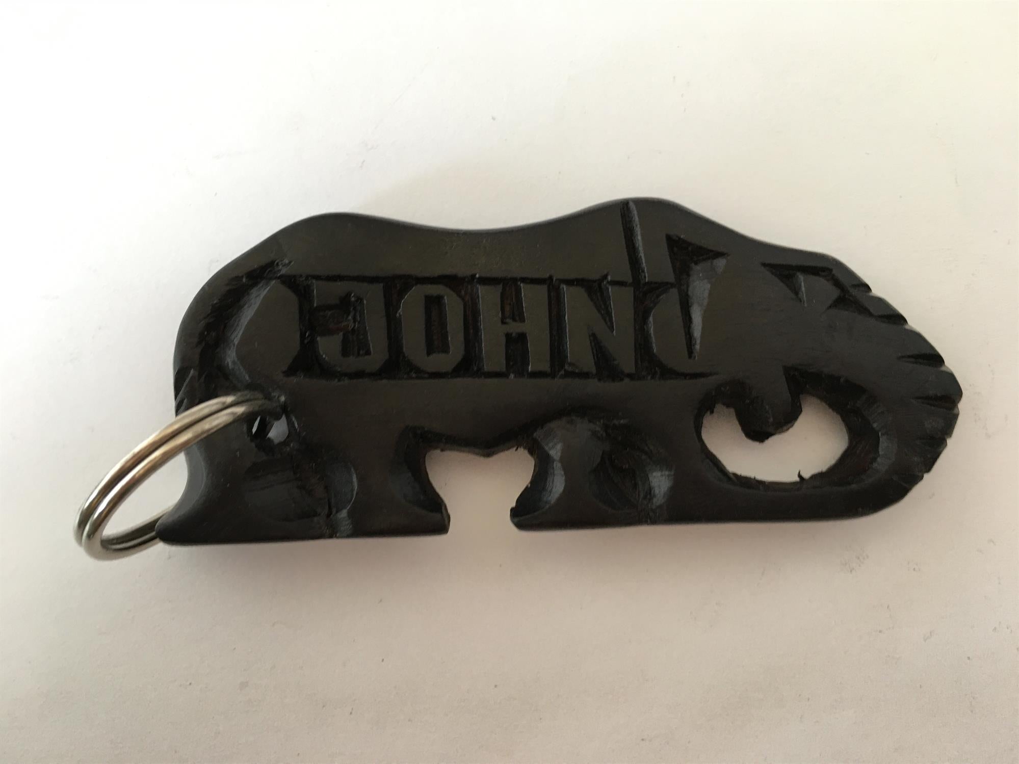Hand-carved zebra key ring from A1 Decoy Ltd, featuring detailed animal design and durable keyring attachment.