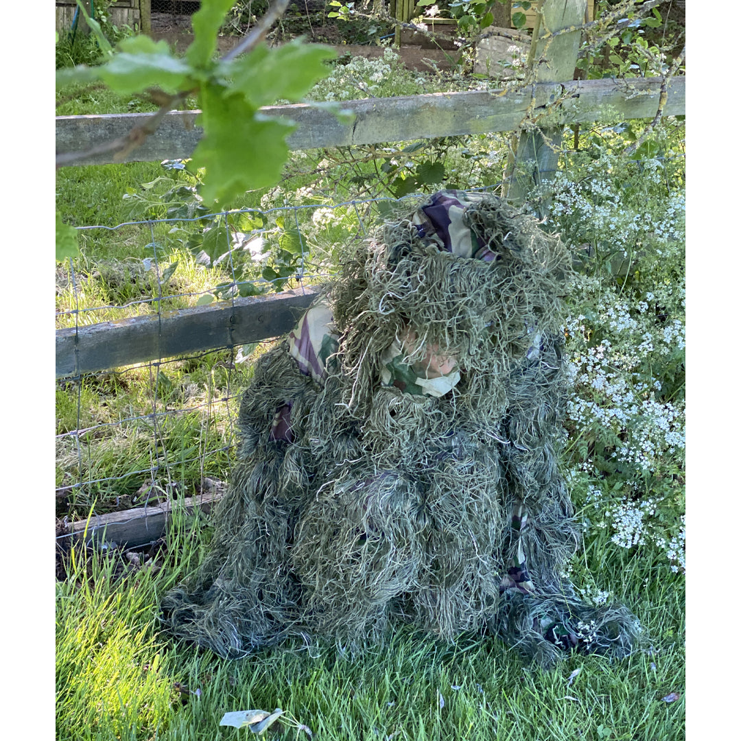 AliExpress hunting camouflage ghillie suit designed for forest concealment, featuring leafy, netted fabric for outdoor stealth.