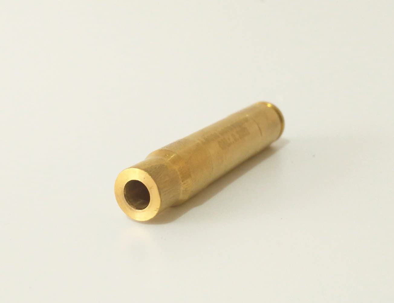 Red dot casing laser bore sighter for .308, .30-06, or 9.3 rifles, showing the laser device and rifle chamber.