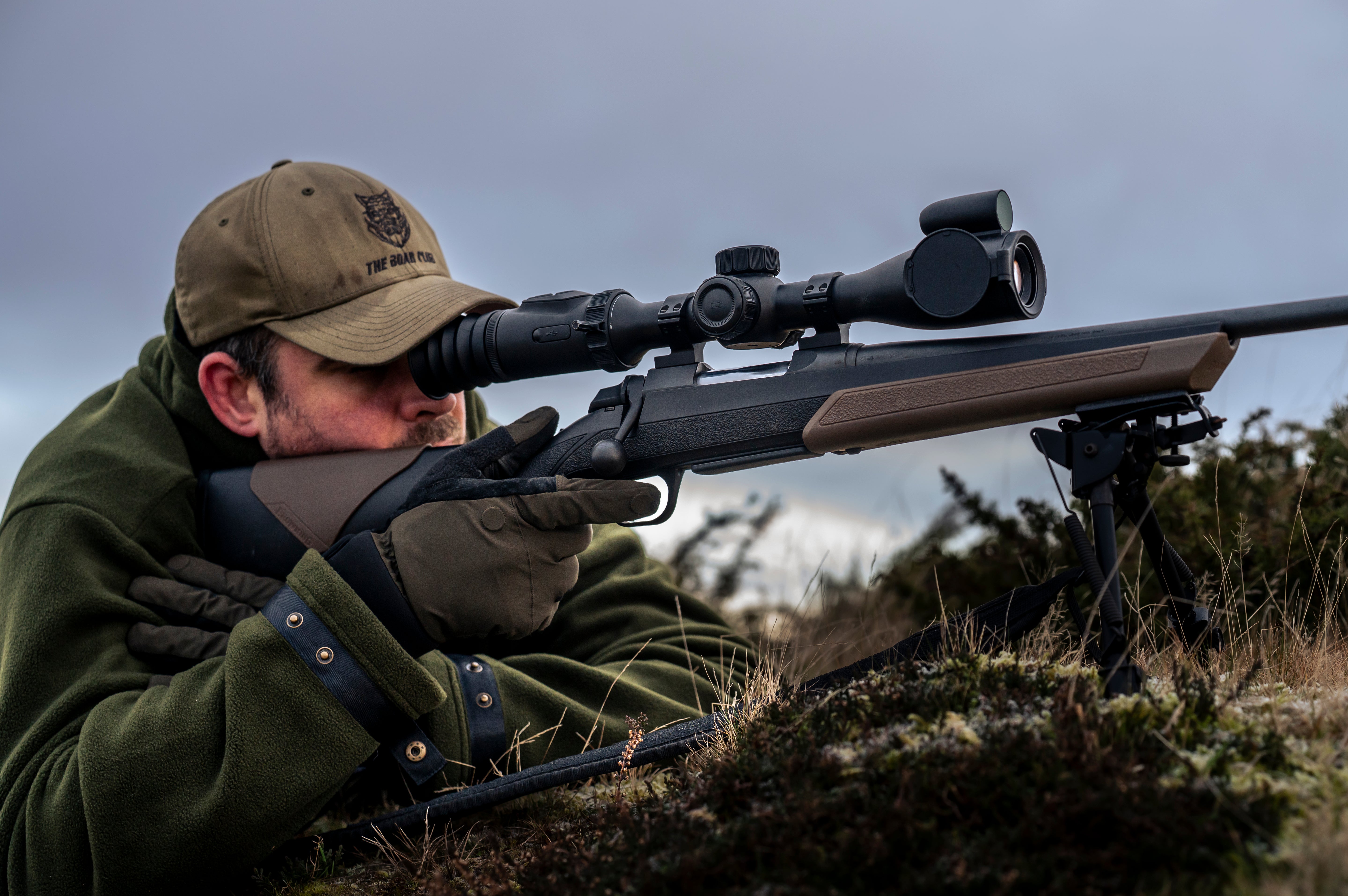 HIKMICRO Alpex A50P non-LRF digital day and night rifle scope mounted on a rifle, showing clear lens and ergonomic design.