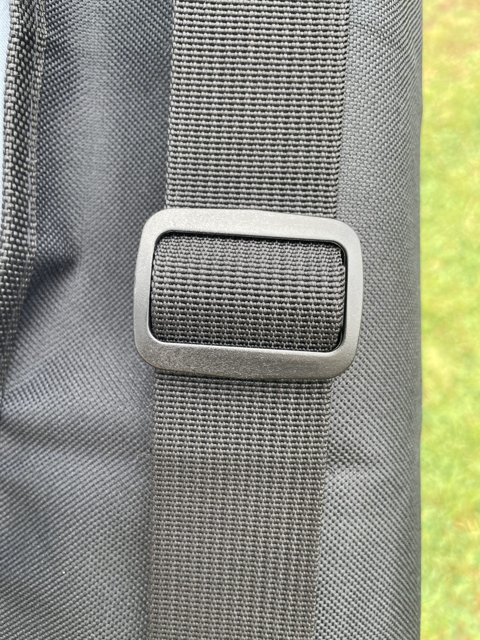 Echo green pocket size roll-up shotgun slip showing compact, foldable leather case with secure elastic closure for easy carry.