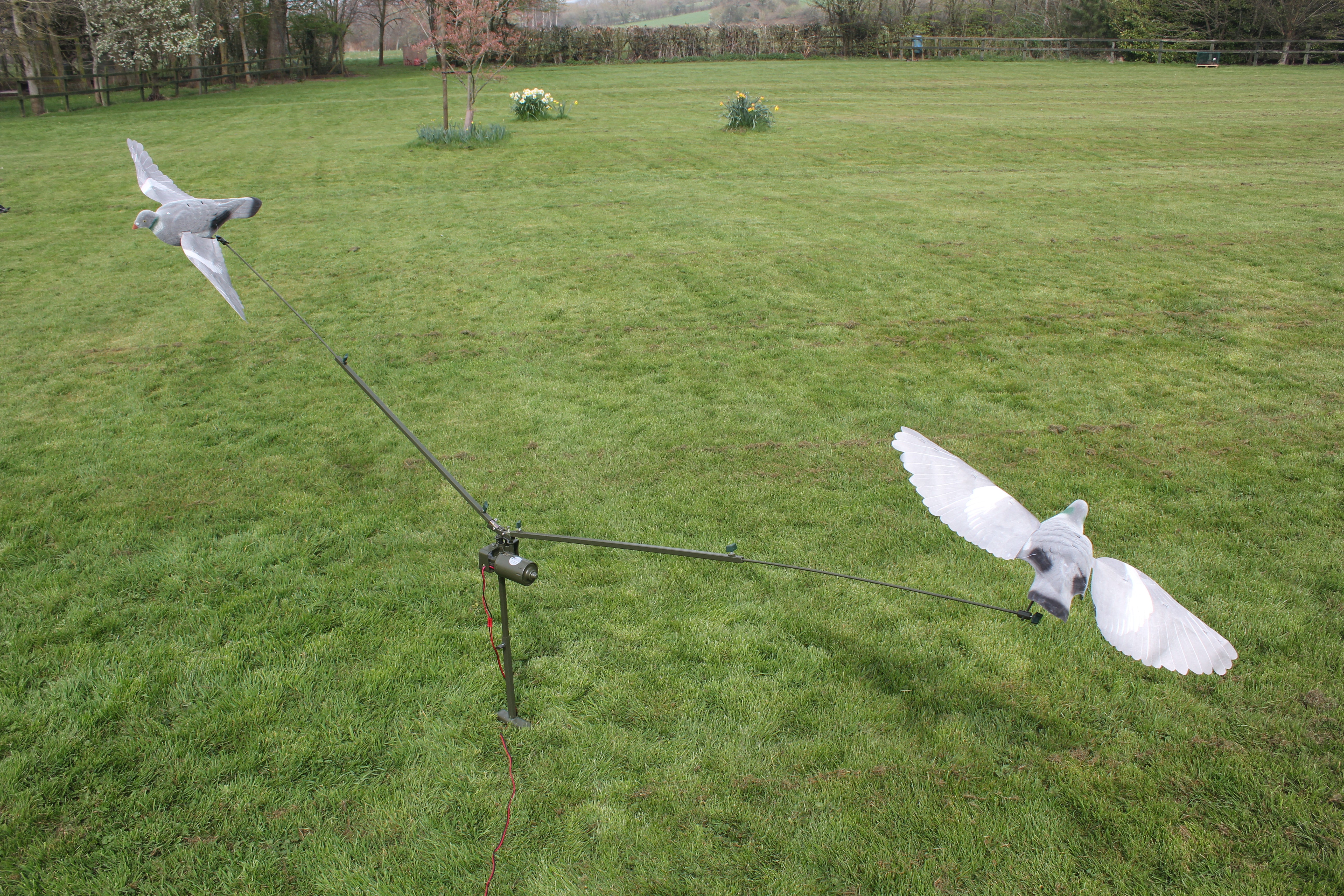 ECHO telescopic pigeon magnet with extendable arm and magnetic head for bird catching and management.