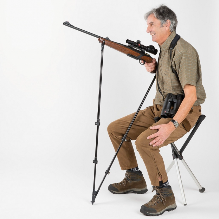 A1 Decoy Ltd Monteria single leg sticks for hunting, showing adjustable camouflage tripod stands on a grassy background.