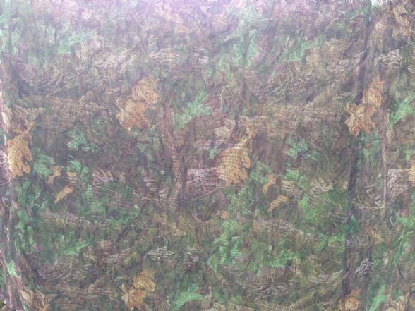 A1 Decoy Clearview Camo Net 25m, lightweight camouflage netting for concealment, shown draped and spread out.
