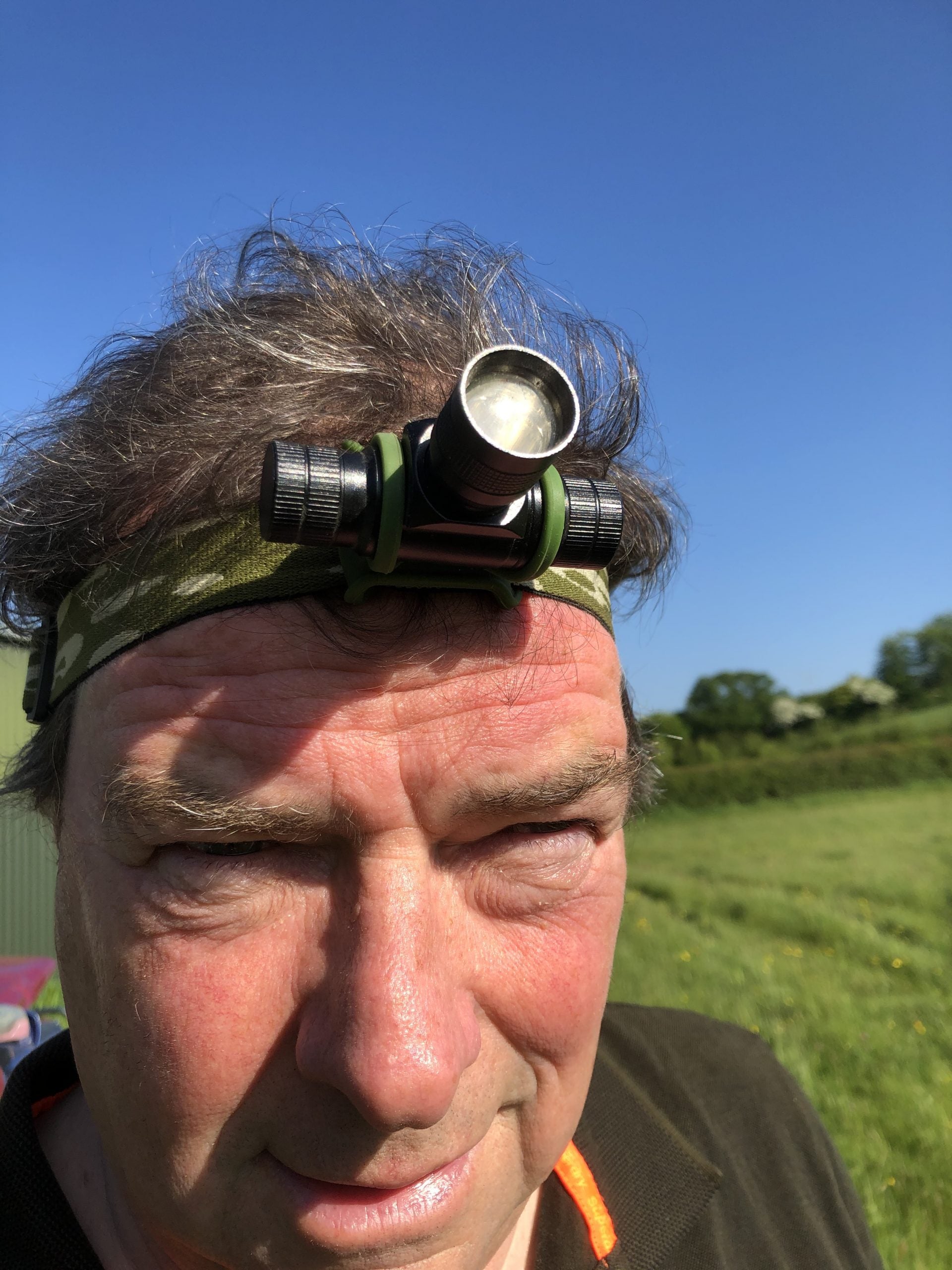 A1 Decoy Slight Seconds Camo Cree rechargeable head torch with adjustable straps and bright LED light for outdoor activities.