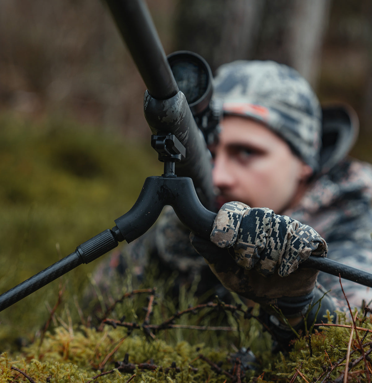 ELITE Spartan Springbok bipod mounted on a rifle, showcasing adjustable legs and sturdy construction for stability during shooting.