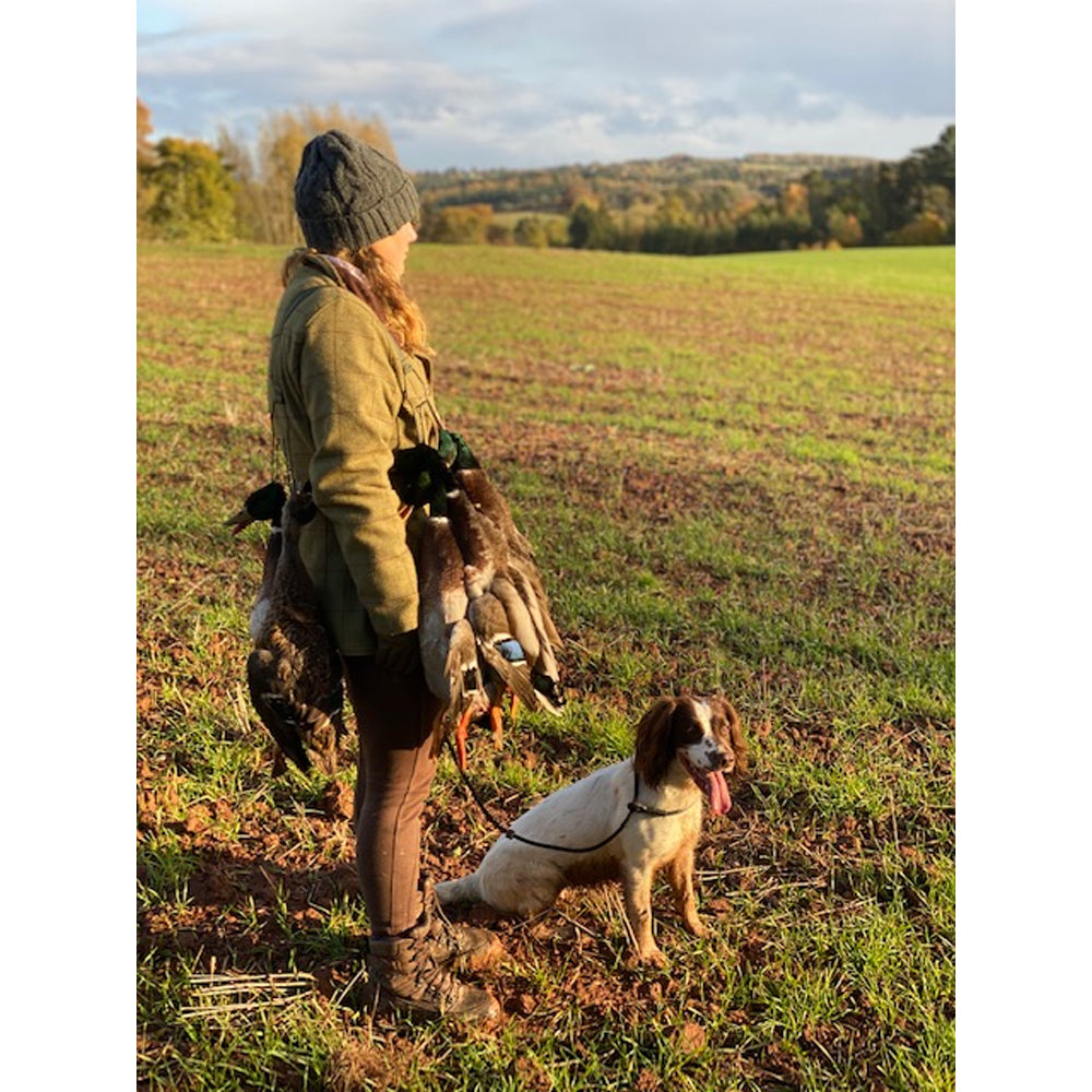 Windy double game carrier with adjustable shoulder strap, designed for easy carrying and secure transport of game.