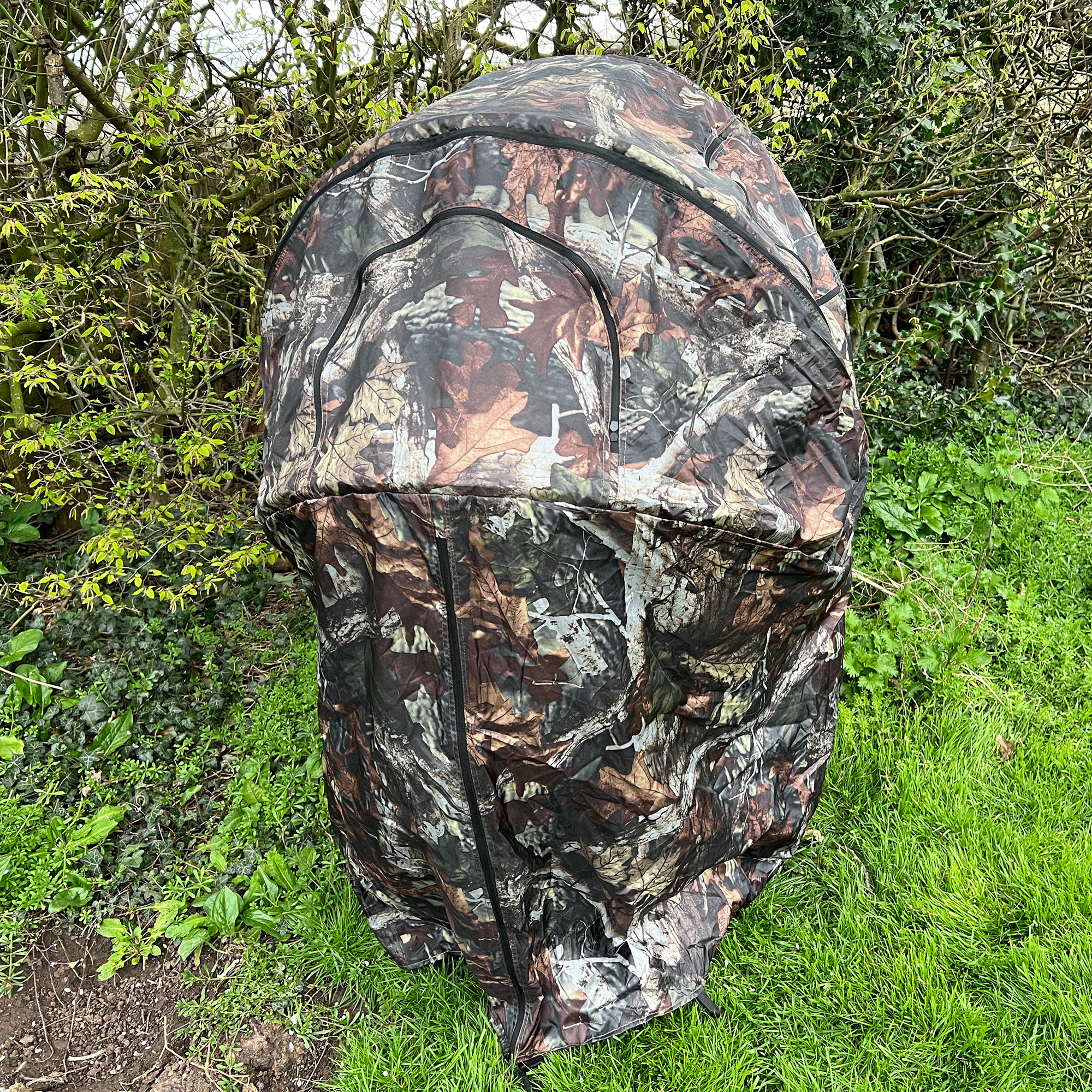 Dale 1-man pop-up hide tent set up outdoors, showcasing its compact, portable design for camping or outdoor activities.