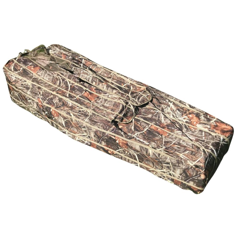 DALE Pop Up Wildfowl Stubble Camo Lay Down Ground Blind set up in a natural outdoor environment for hunting or wildlife observation.