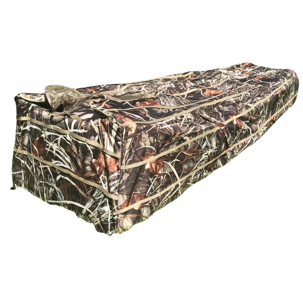 DALE Pop Up Wildfowl Stubble Camo Lay Down Ground Blind set up in a field for hunting with camouflage pattern and sturdy frame.