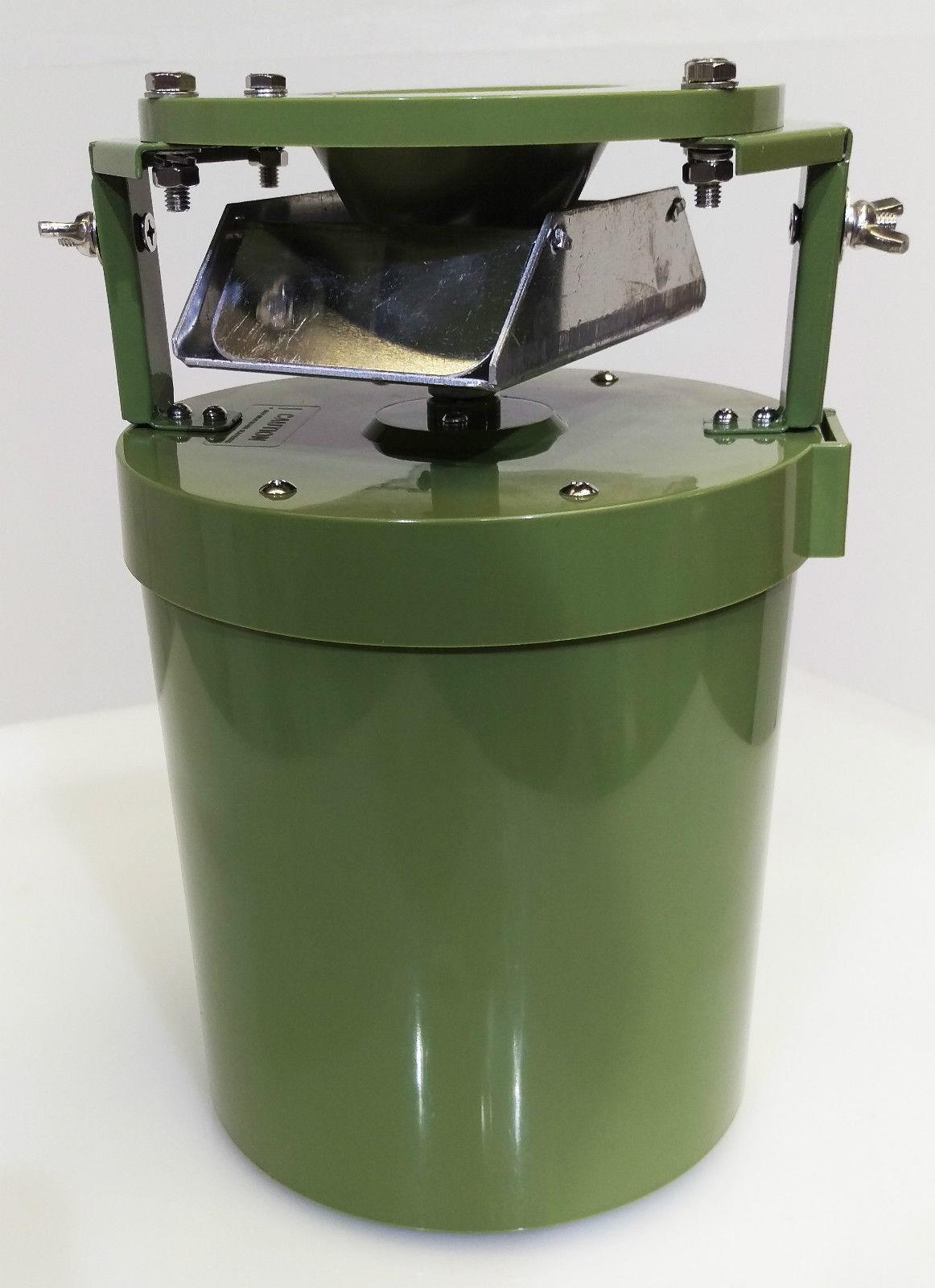 Round plastic auto feeder by DALE, suitable for 12V or 6V systems, designed for automatic feeding of small animals or birds.