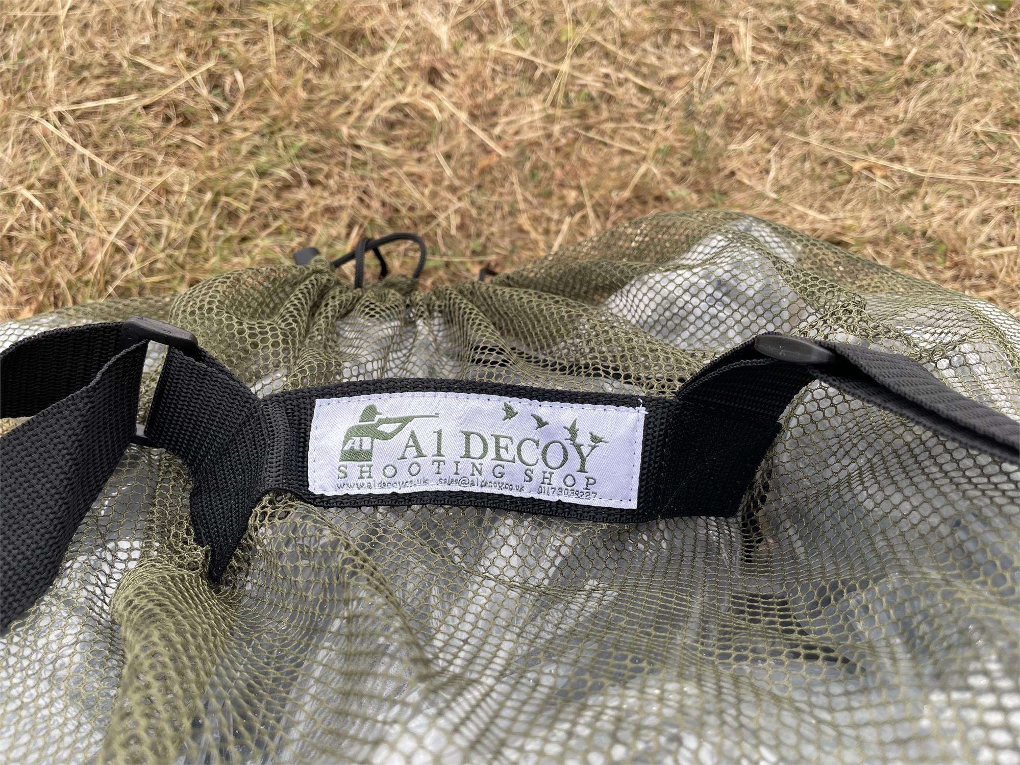 Echo decoy net bag with adjustable straps and mesh design, ideal for carrying hunting decoys or outdoor gear.