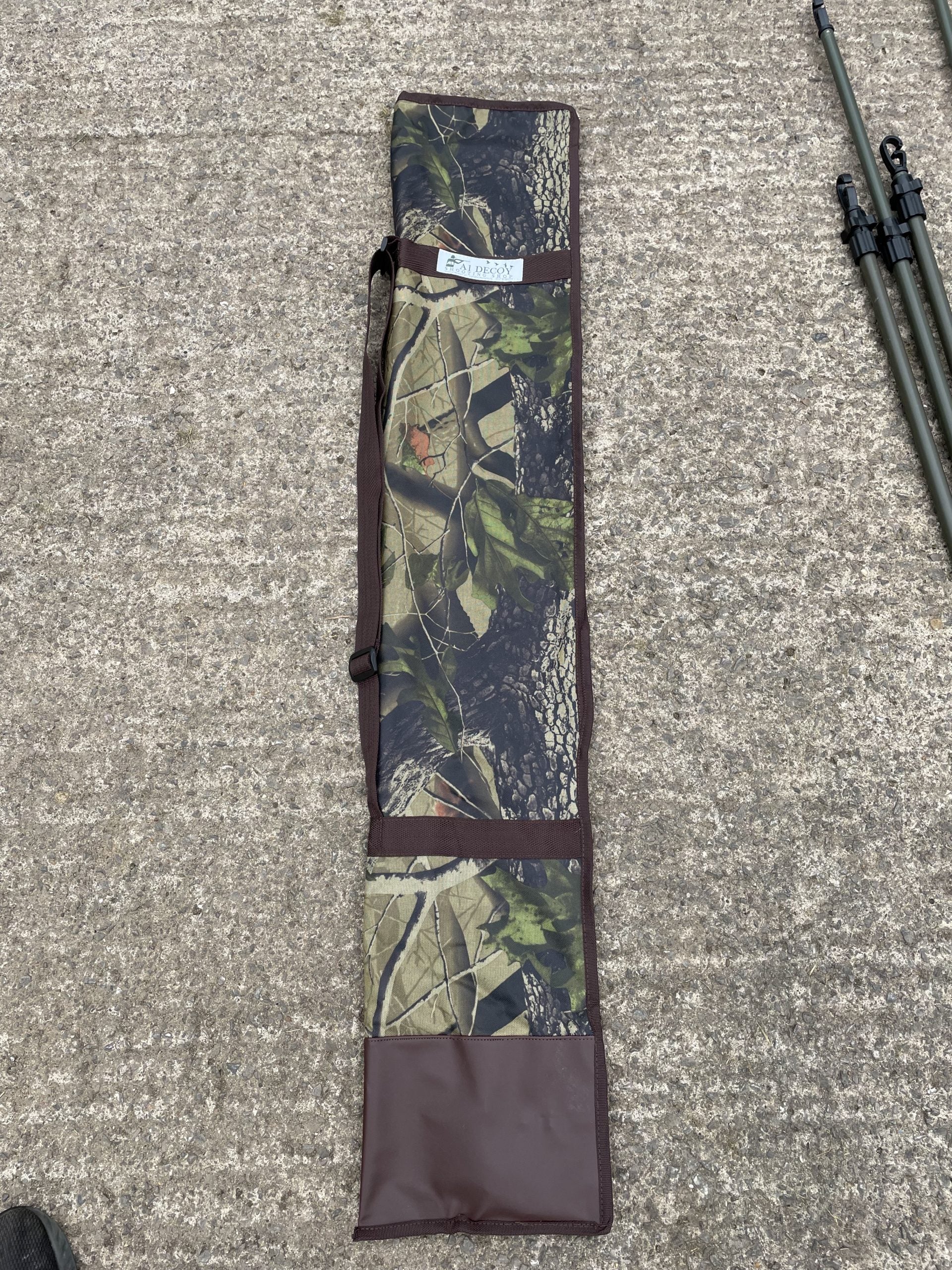 ECHO heavy duty hide poles kit with four durable green poles for outdoor hunting or wildlife activities.