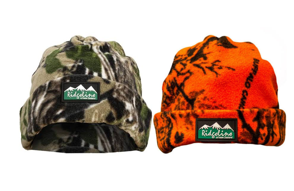 Highland Ridgeline Polar Fleece Beanie in camouflage with blaze pattern, warm and cozy winter headwear.