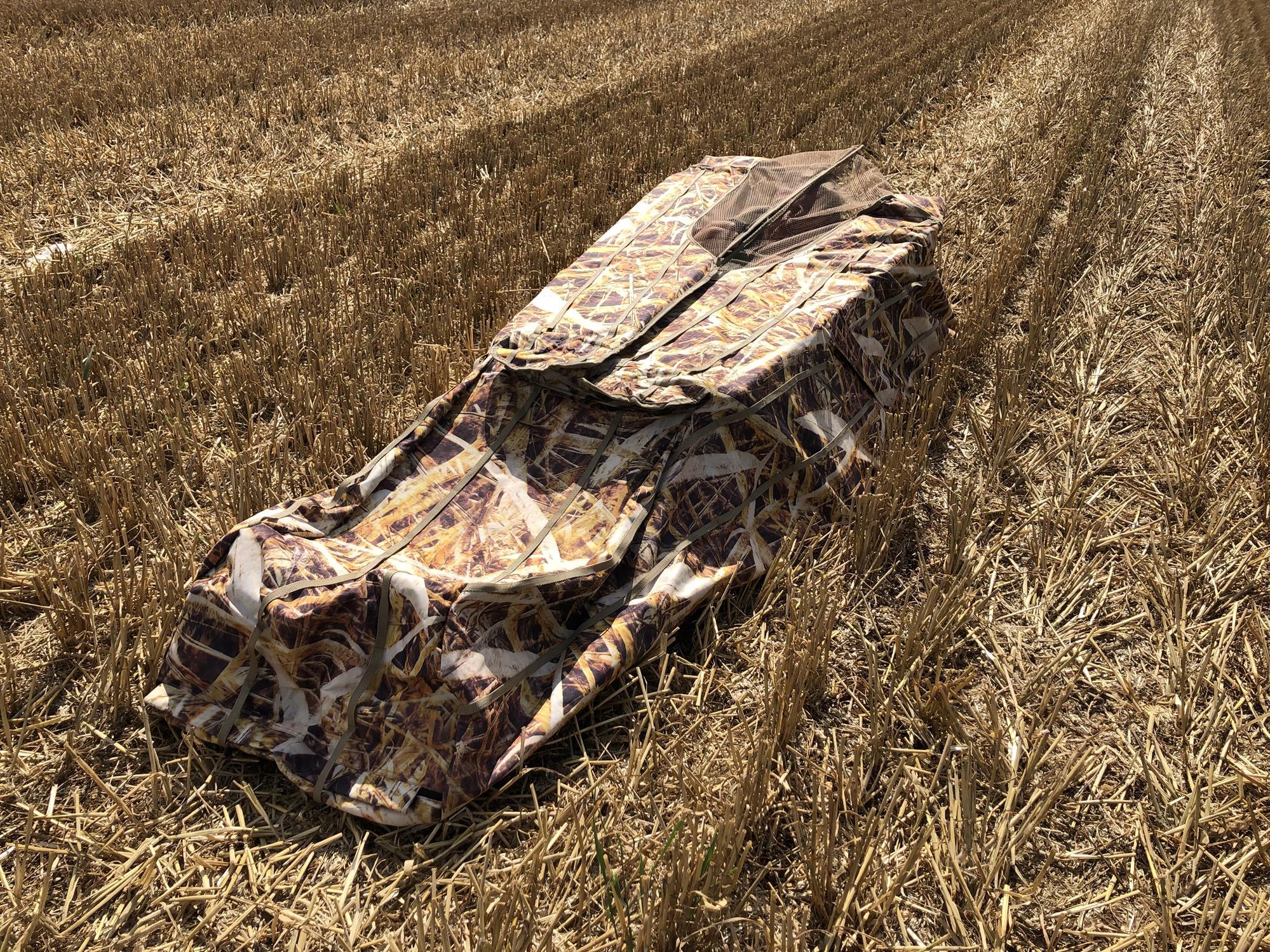 DALE goose blind laydown hide with pop-up camouflage ground cover for wildfowl hunting, designed for easy setup and concealment