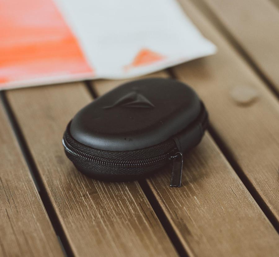 DCID Decibullz premium carry case for headphones, durable black case with zipper and handle for secure storage and transport.
