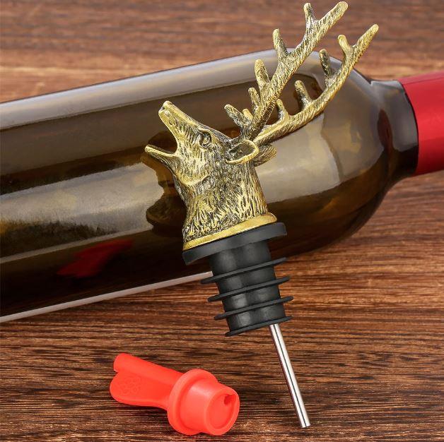 Deer head wine pourer and stopper crafted from ceramic, featuring a detailed deer design, ideal for wine bottles.
