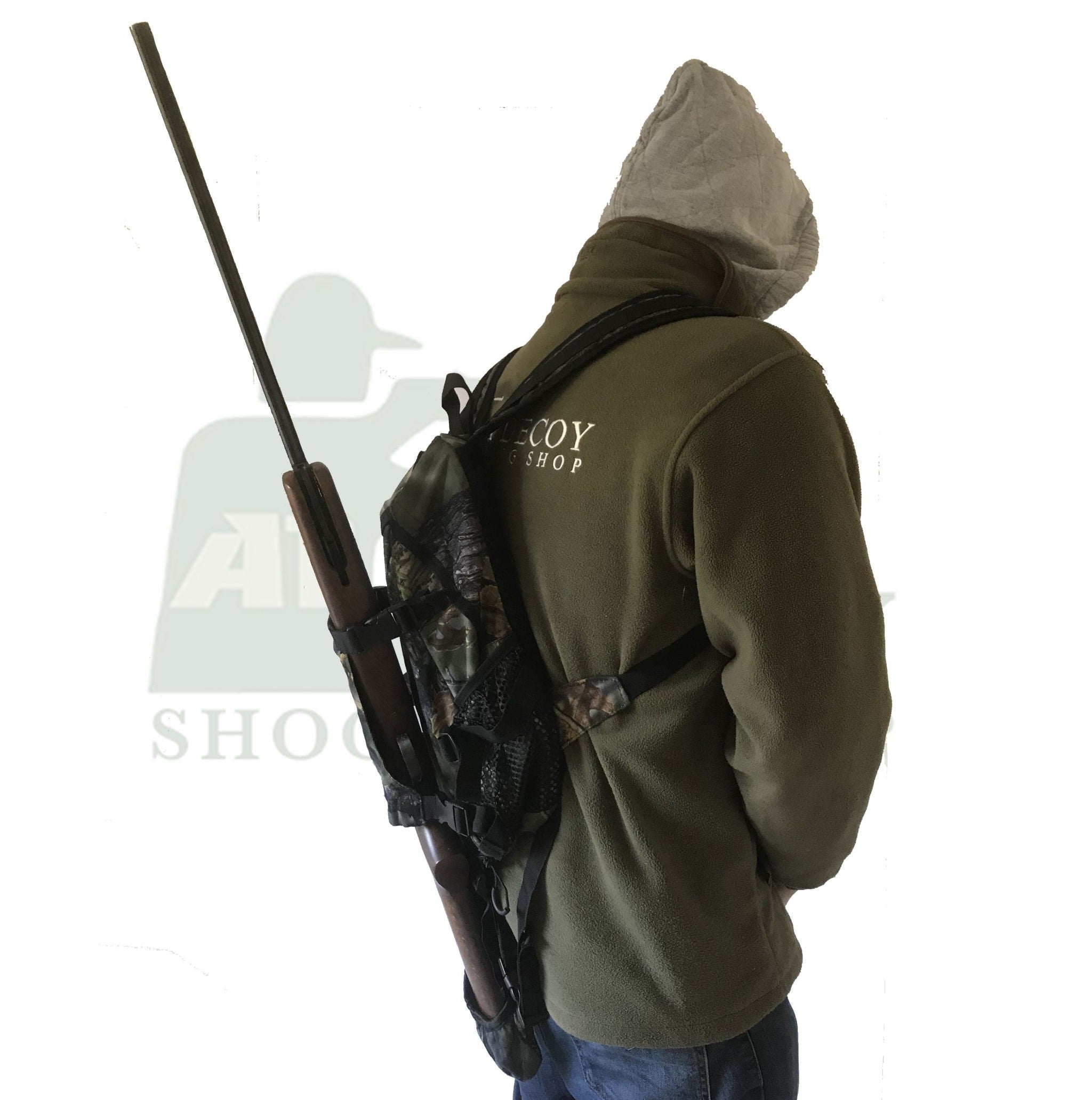 Simon backpack with rifle holder, durable fabric, adjustable straps, designed to securely carry a rifle on outdoor adventures.