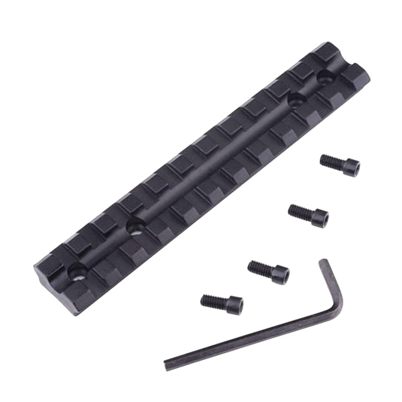 Ruger 10/22 rifle with low profile see-through Weaver Picatinny rail mount for scope and accessory attachment.