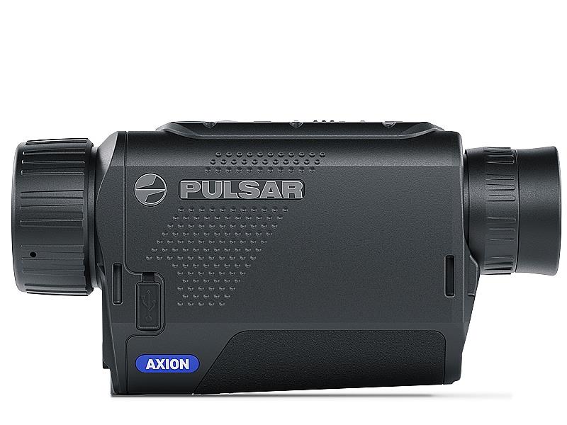 A Pulsar Axion XM30F thermal monocular by A1 DECOY LTD showing the compact device with thermal imaging lens and controls.