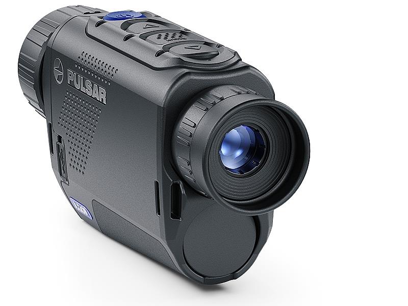 A Pulsar Axion XM30F thermal monocular by A1 DECOY LTD showing its compact design and thermal imaging lens in a close-up view.