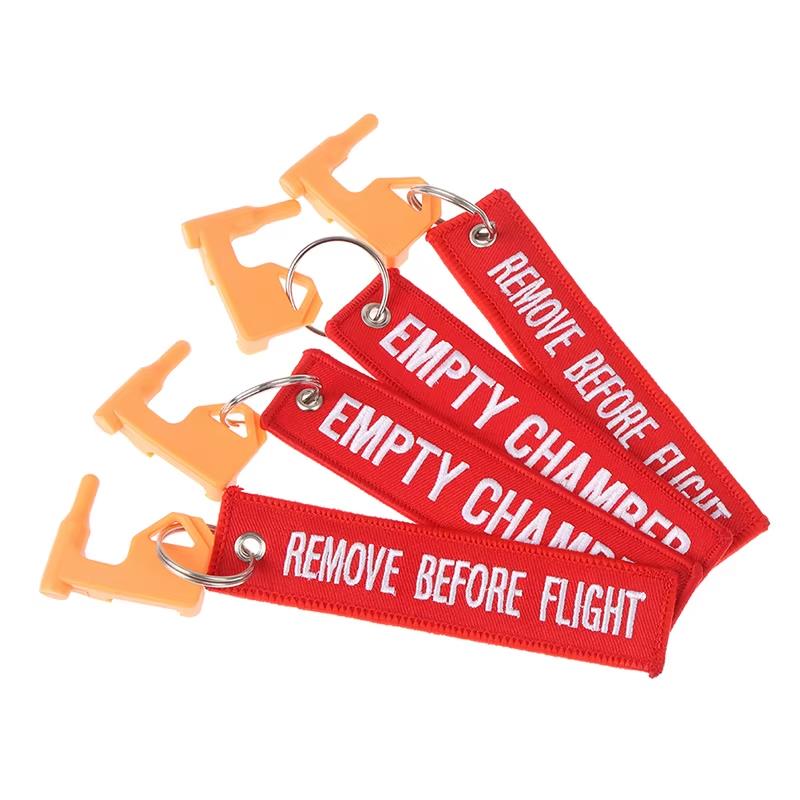 Pair of ALIEXPRESS Tactical Chamber Safety Flags, durable accessories for firearm chamber safety and visibility.