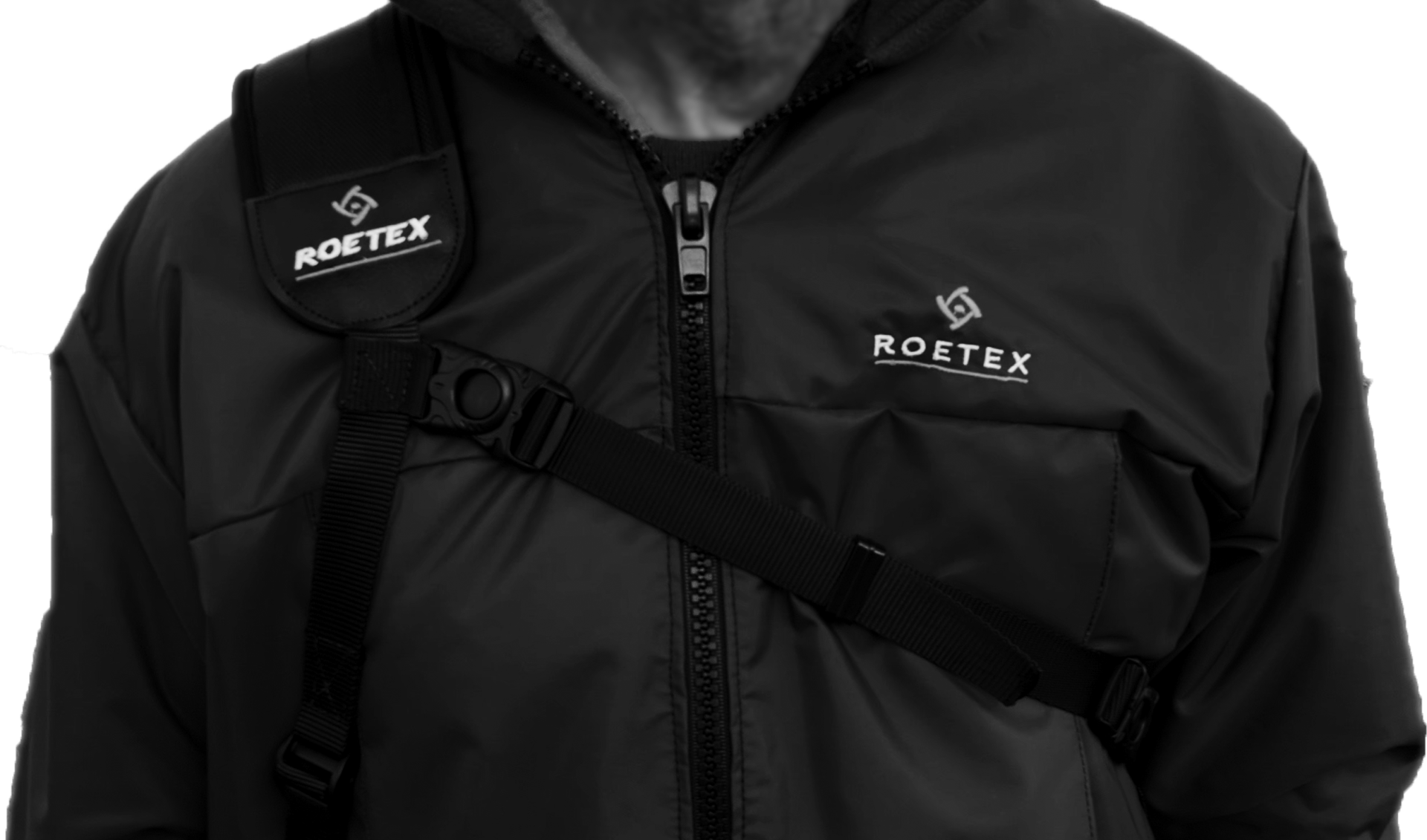 ROETEX Hunter Pro rifle sling shown on right shoulder, adjustable strap with padding for comfortable firearm carrying.