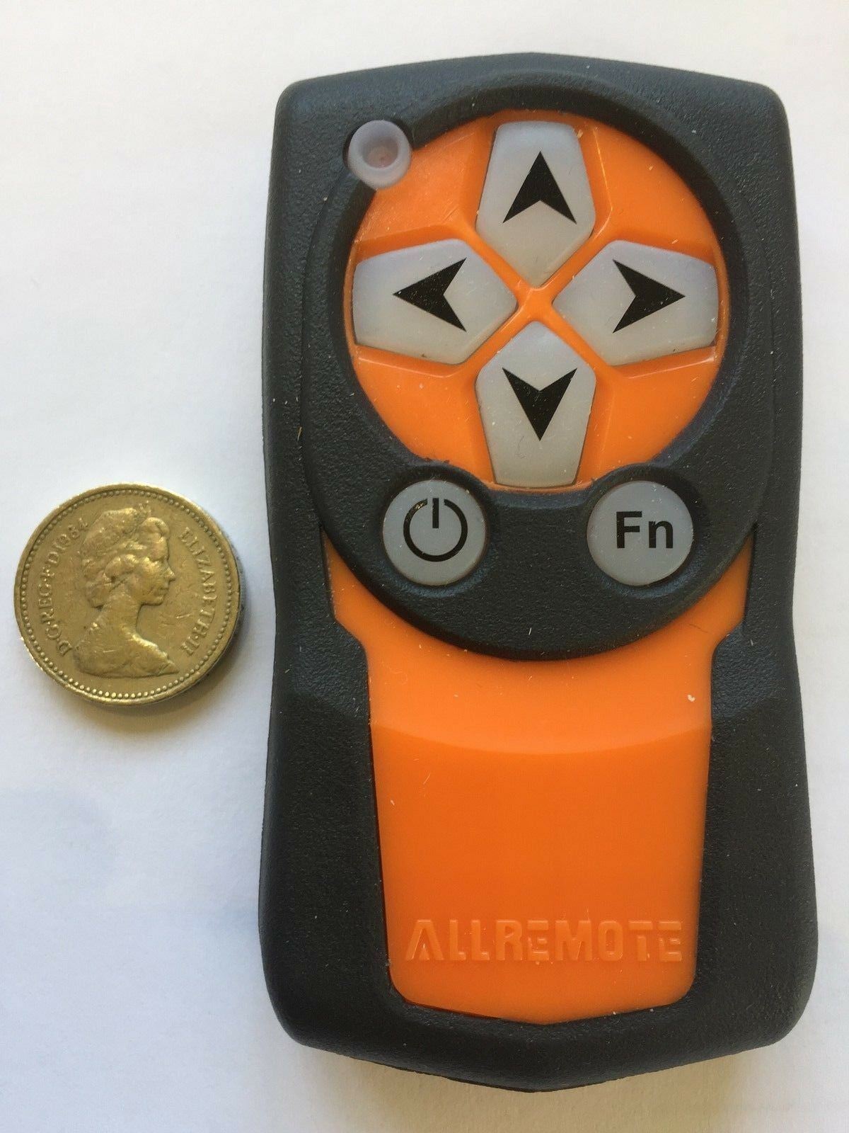 ALIEXPRESS smart light remote control with buttons for adjusting lighting settings and brightness.