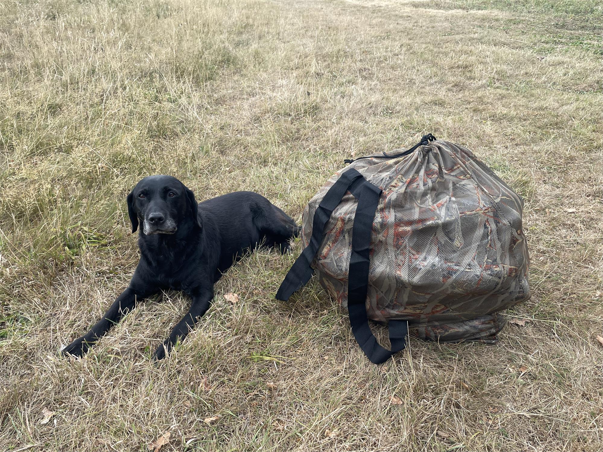 Simon camo mesh decoy bag with shoulder straps for easy carrying and storage of hunting decoys.