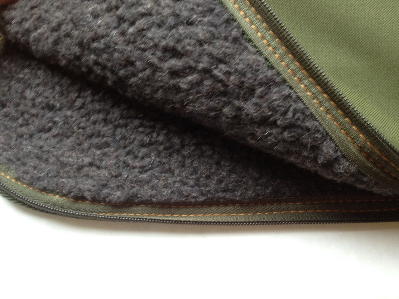 Sportsman AKAH rifle slip made of durable material, designed to protect a rifle during storage and transport.