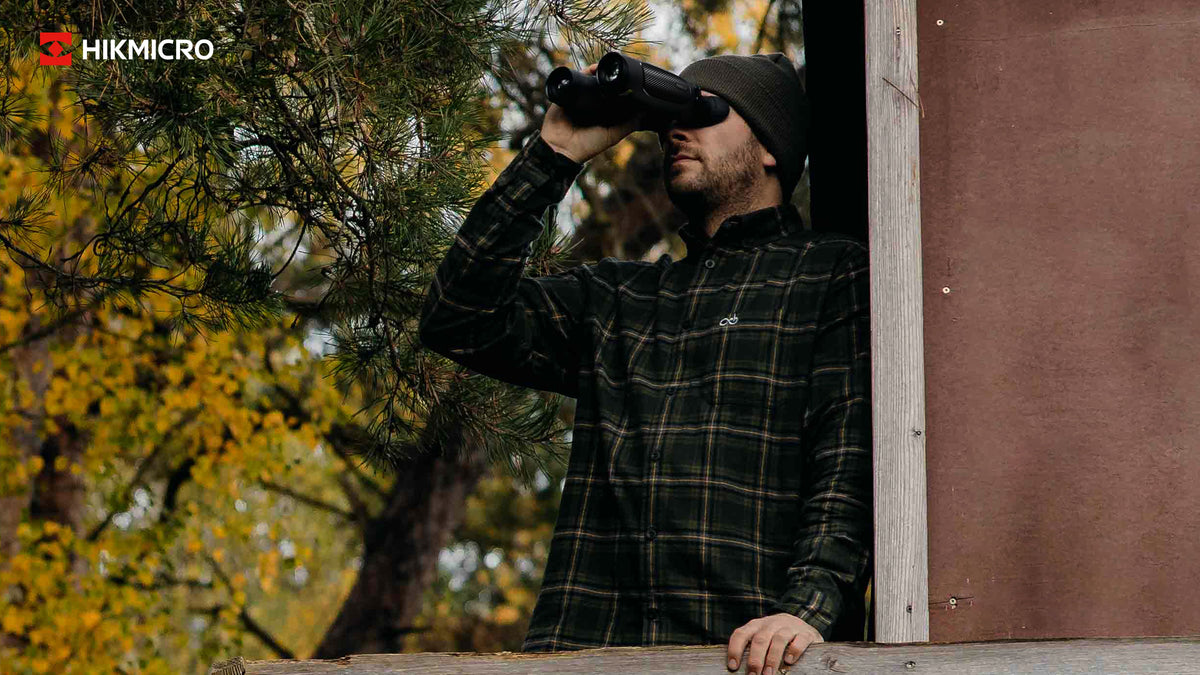 ELITE Habrok 4K HH35L 2.0 thermal binoculars showing dual eyepieces, control buttons, and thermal imaging display.