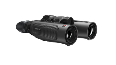 ELITE Habrok 4K HH35L 2.0 thermal binoculars showing dual eyepieces and thermal imaging display in a natural outdoor setting.
