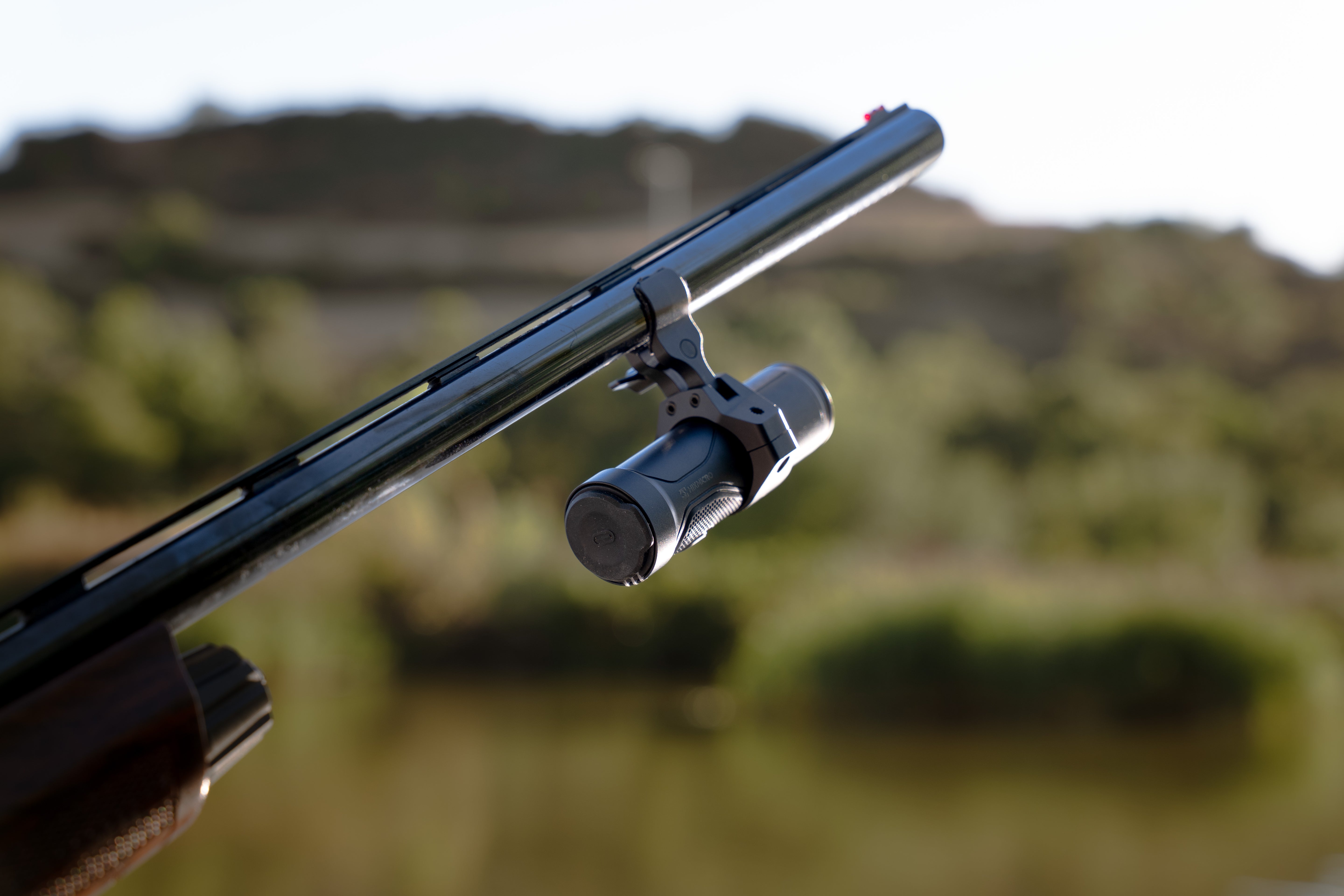 ELITE HIKMICRO A7E HIKCam 4K action shot camera capturing outdoor twilight scene with rugged design and advanced optics.