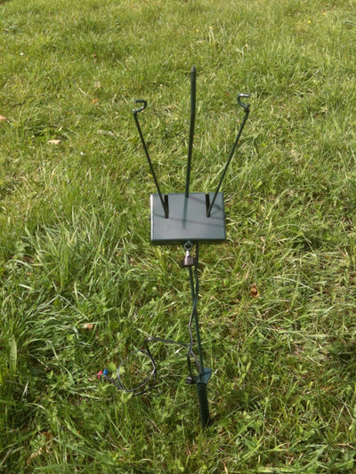 A Ford Turbo Pigeon Flapper Bundle with magnets, battery, timer, and remote, featuring a flapper for pest control.