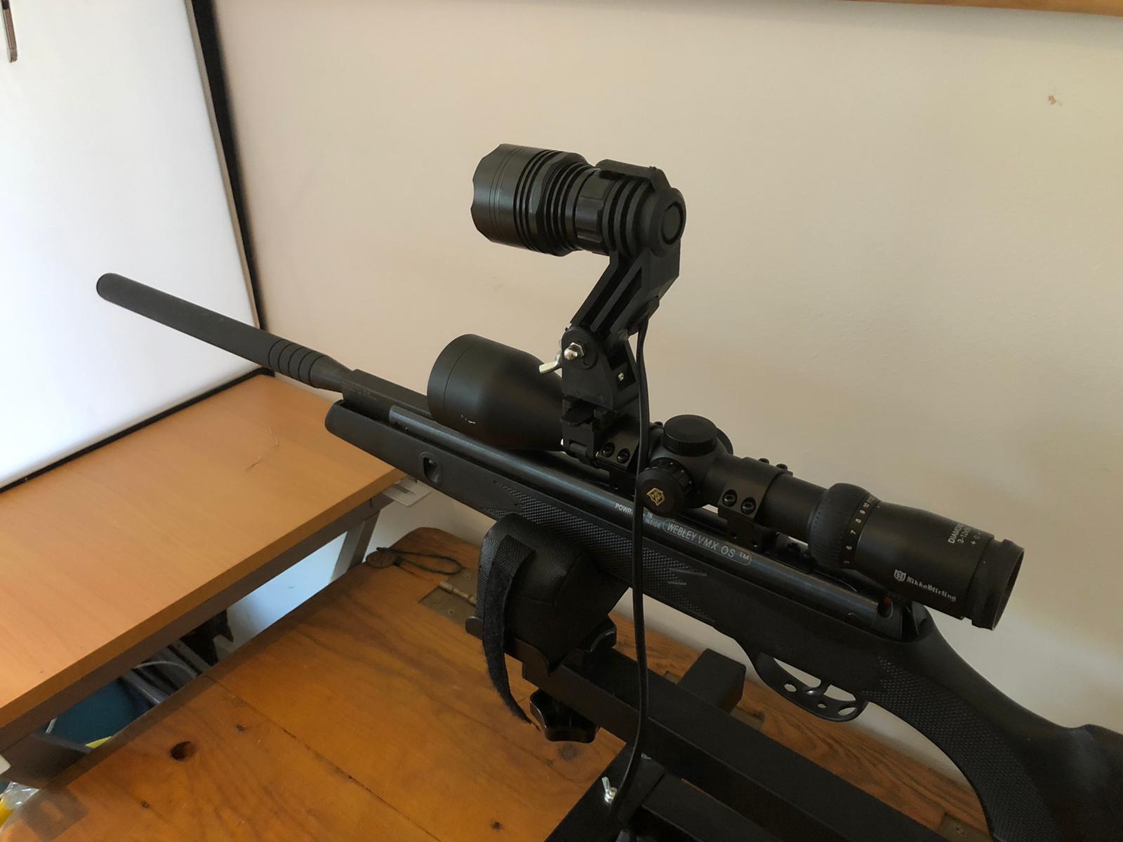 A1 Decoy LED handheld and scope-mounted lamp with 300m+ beam distance, black durable design, ideal for outdoor and tactical use.