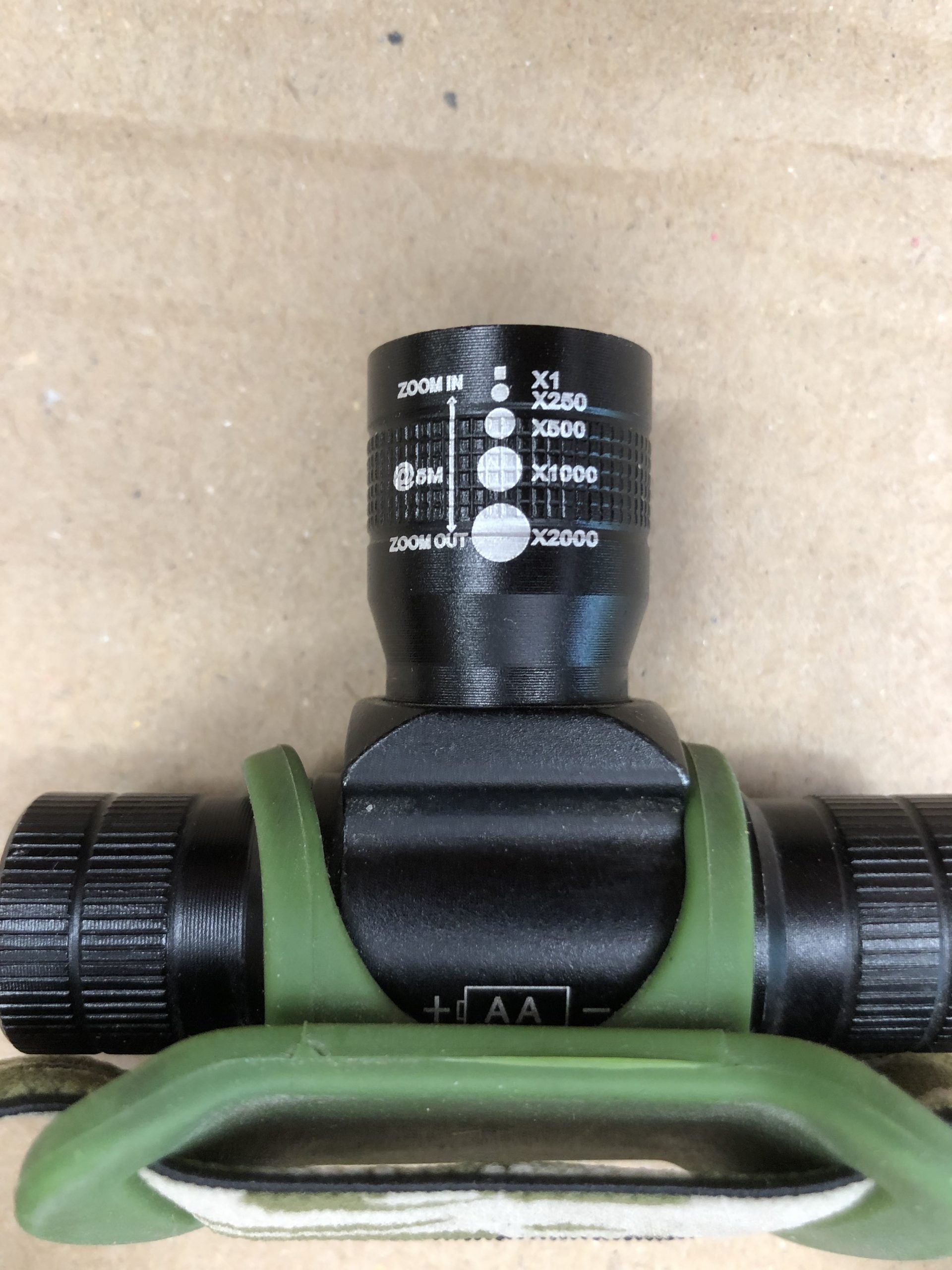 A1 Decoy Slight Seconds Camo Cree rechargeable head torch with adjustable strap and bright LED light for outdoor activities.