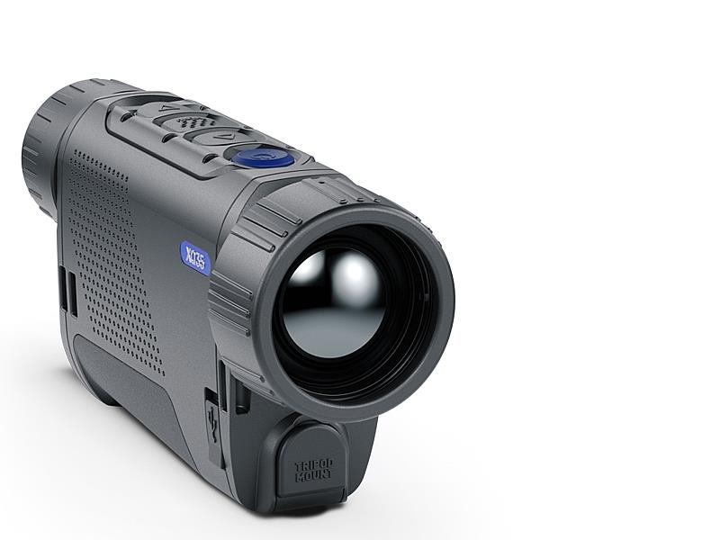 A1 DECOY LTD Pulsar Axion 2 XQ35 thermal monocular showing its compact design and lens in a clear outdoor setting.