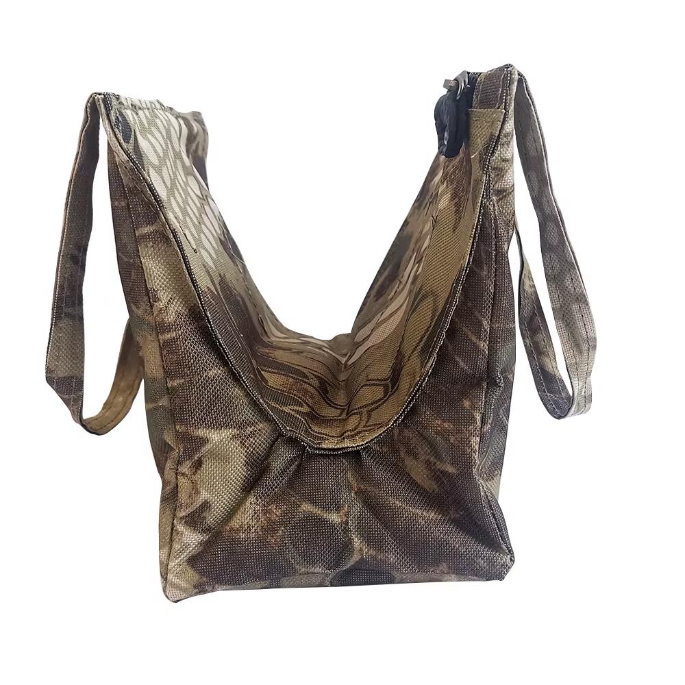Unfilled A1 DECOY LTD window mount gun rest bag with adjustable strap and padded interior for firearm support.