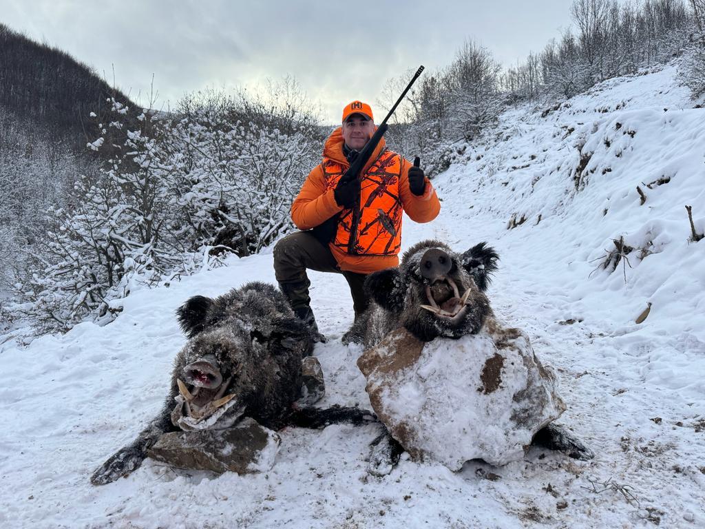 A1 DECOY LTD wild boar hunting in Turkey image showing hunters in a forested area during a winter hunt in The Hidden Valley.